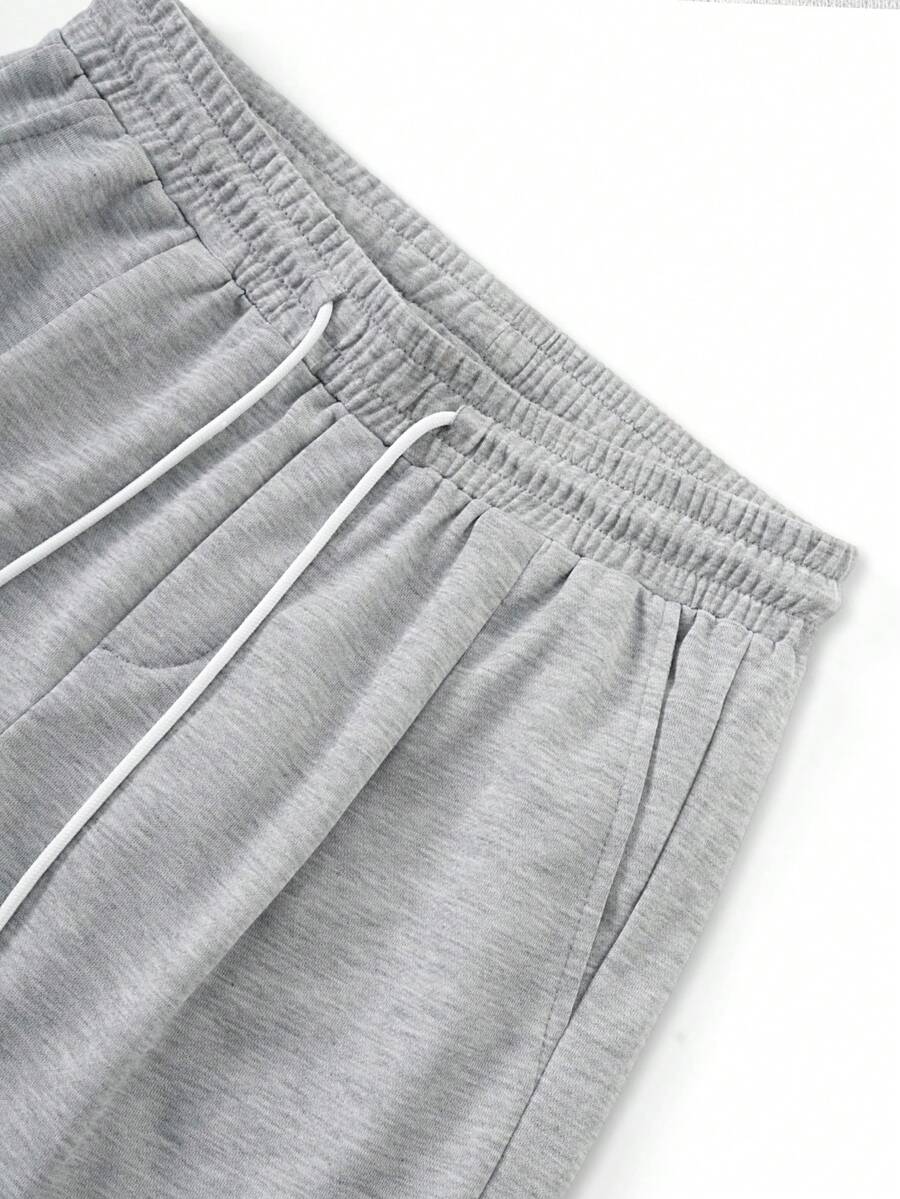 Men's Solid Color Drawstring Waist Pocket Loose Fit Sports Long Pants